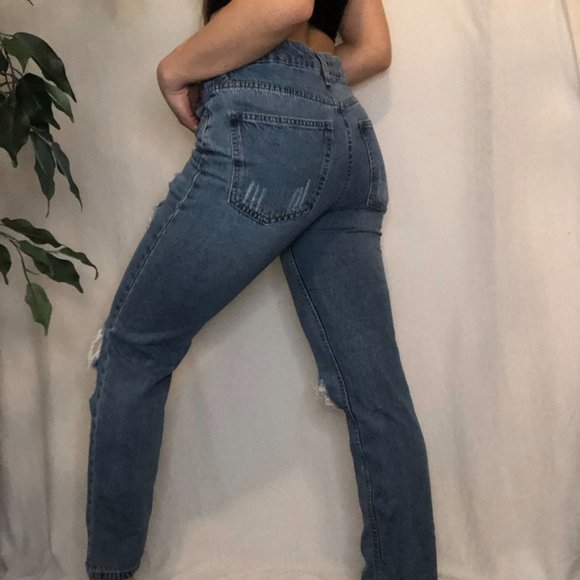 Ripped Distressed Mom Jeans with a Light Wash - Picture 3 of 4